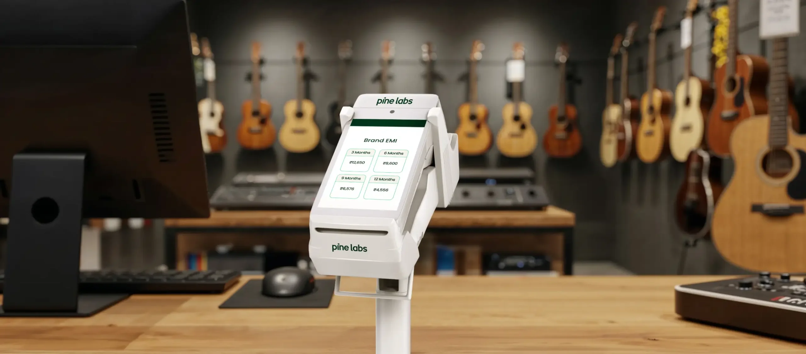 Pine Labs BNPL terminal in a musical instrument store Pine Labs Buy Now Pay Later service at a guitar store
