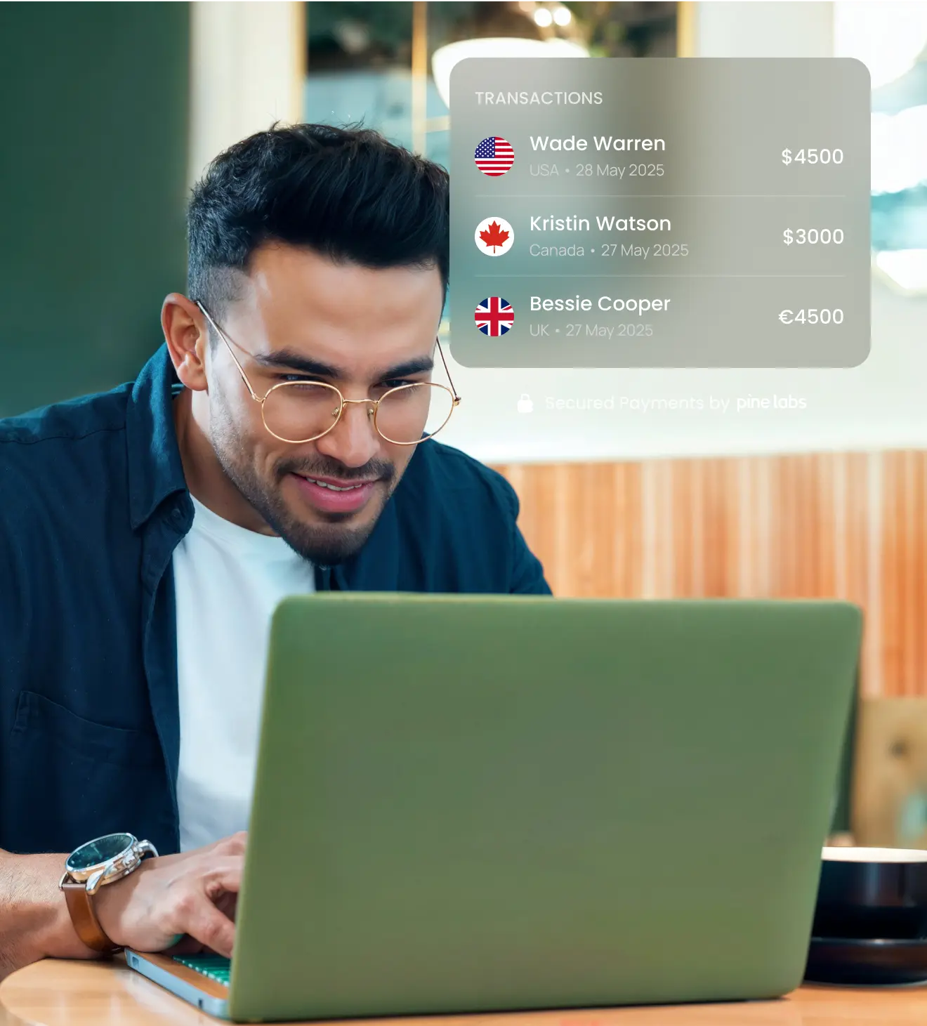 Man using a laptop to manage foreign transactions with DCC feature showing customer payments in different currencies
