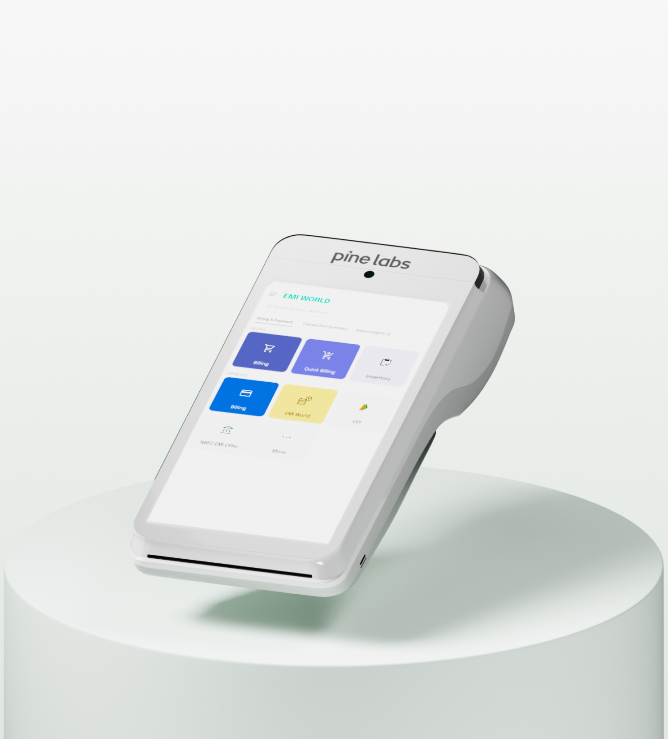 Pine Labs touchscreen PoS terminal on a pedestal displaying multiple payment options like EMI, UPI, wallet, and loyalty rewards