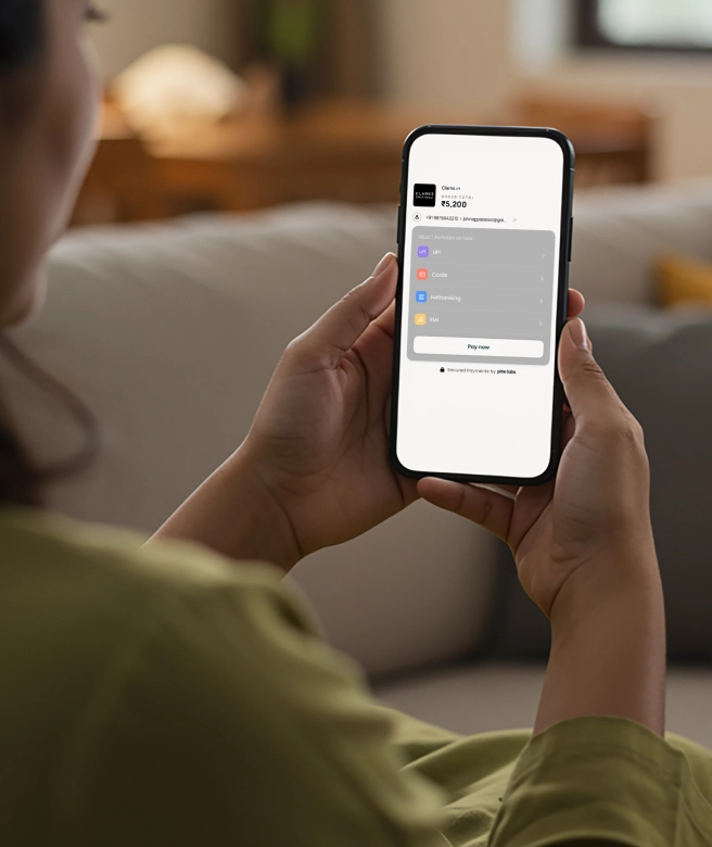 Woman using a smartphone to make utility bill payments through a digital platform