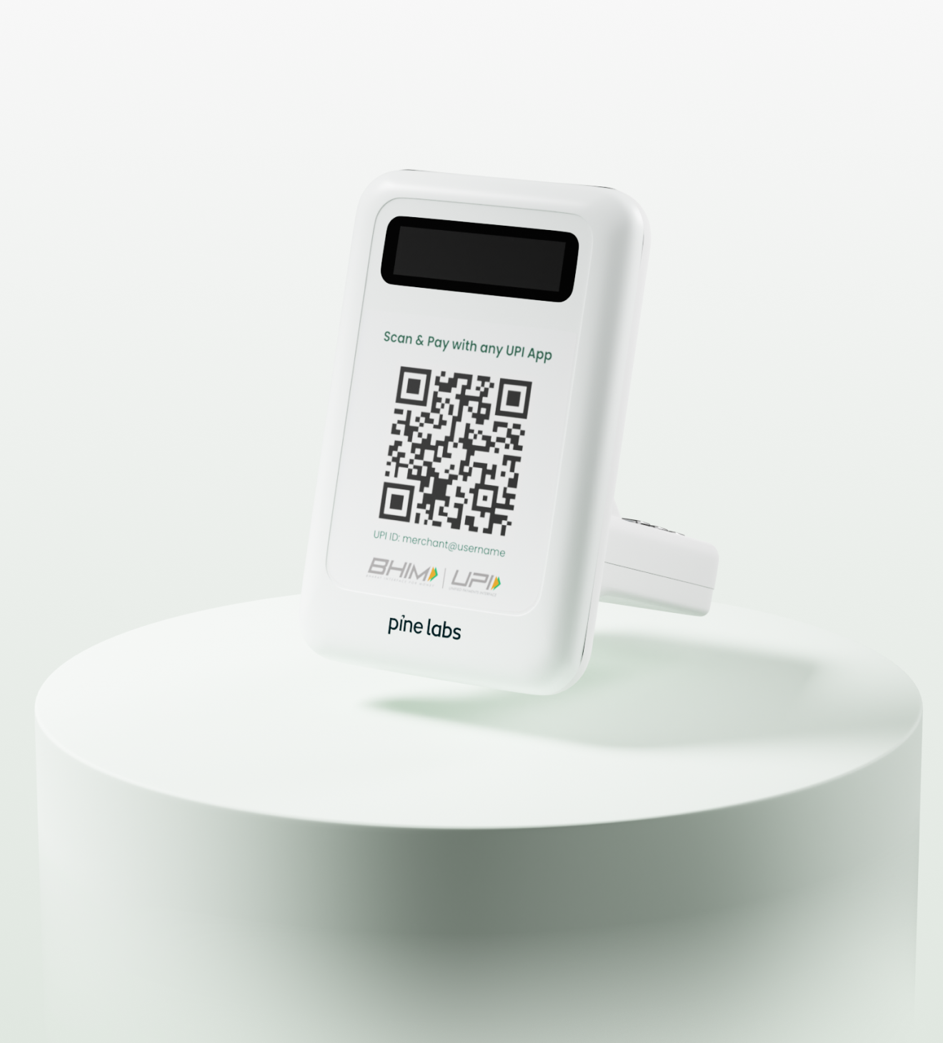 Compact Pine Labs Mini soundbox with QR code for UPI payments, displayed on a white platform with upgrade button and feature highlights
